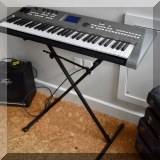 M01. Yamaha keyboard MM6 with stand 